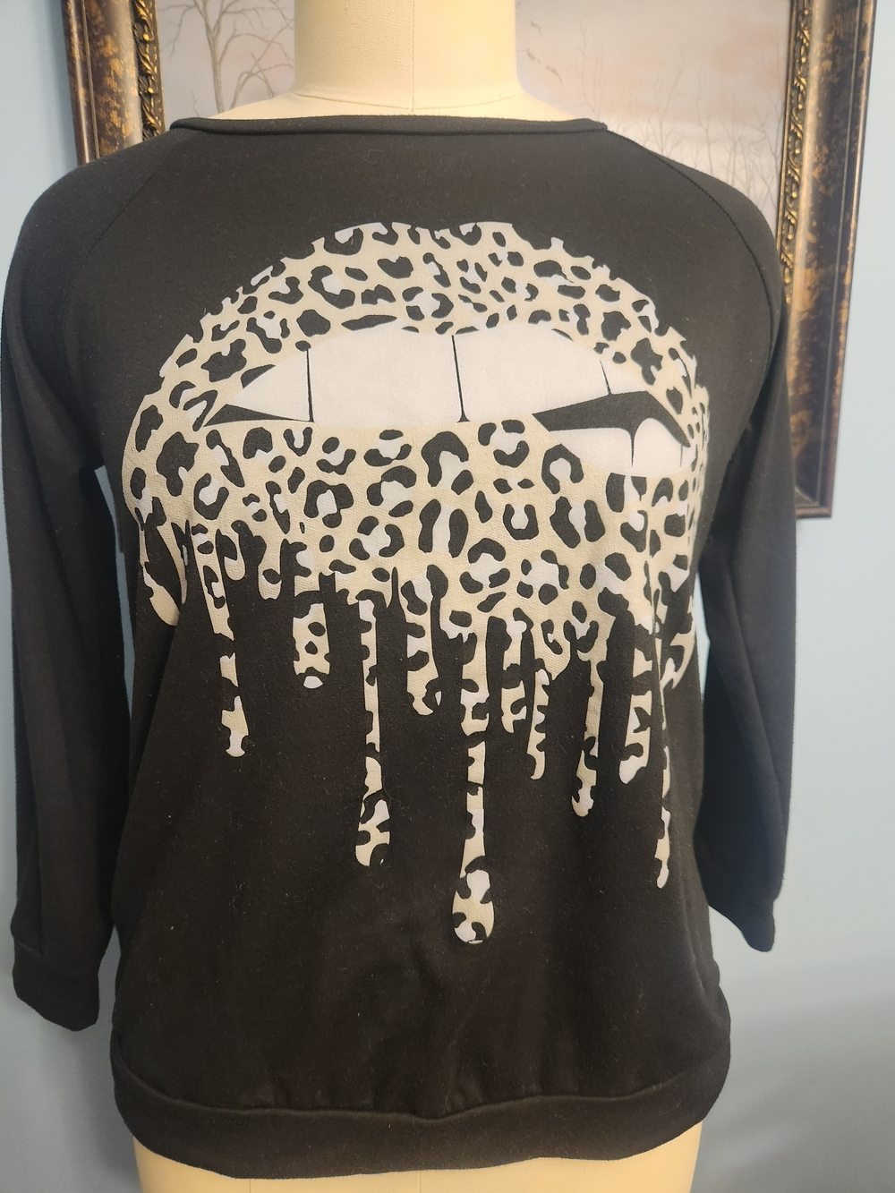 BiBi Black Sweatshirt with White Leopard Drip Graphic